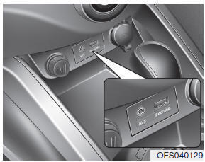 Hyundai Veloster: Aux, USB and iPod port. If your vehicle has an aux and/or USB(universal serial bus) port or iPod port,