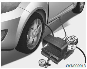 Hyundai Veloster: Using the Tire Mobility Kit. 6. Ensure that the compressor is switched off, position 0.