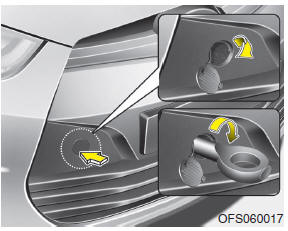 Hyundai Veloster: Removable towing hook. 1. Open the tailgate, and remove the towing hook from the tool case.