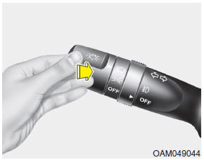 Hyundai Veloster: High beam operation. To turn on the high beam headlights, push the lever away from you. Pull it back