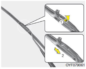 Hyundai Veloster: Blade replacement. 2. Lift up the wiper blade clip. Then pull down the blade assembly and remove