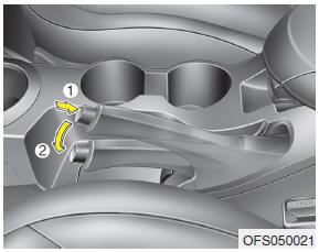 Hyundai Veloster: Parking brake. Releasing the parking brake